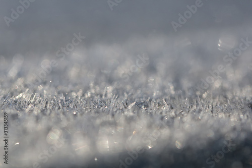 Background with frozen surface covered by hoar-frost.
