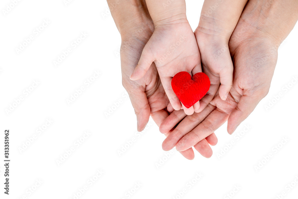 Obraz premium Love concept: Mother and kid's hands hold red heart on white background and clipping path