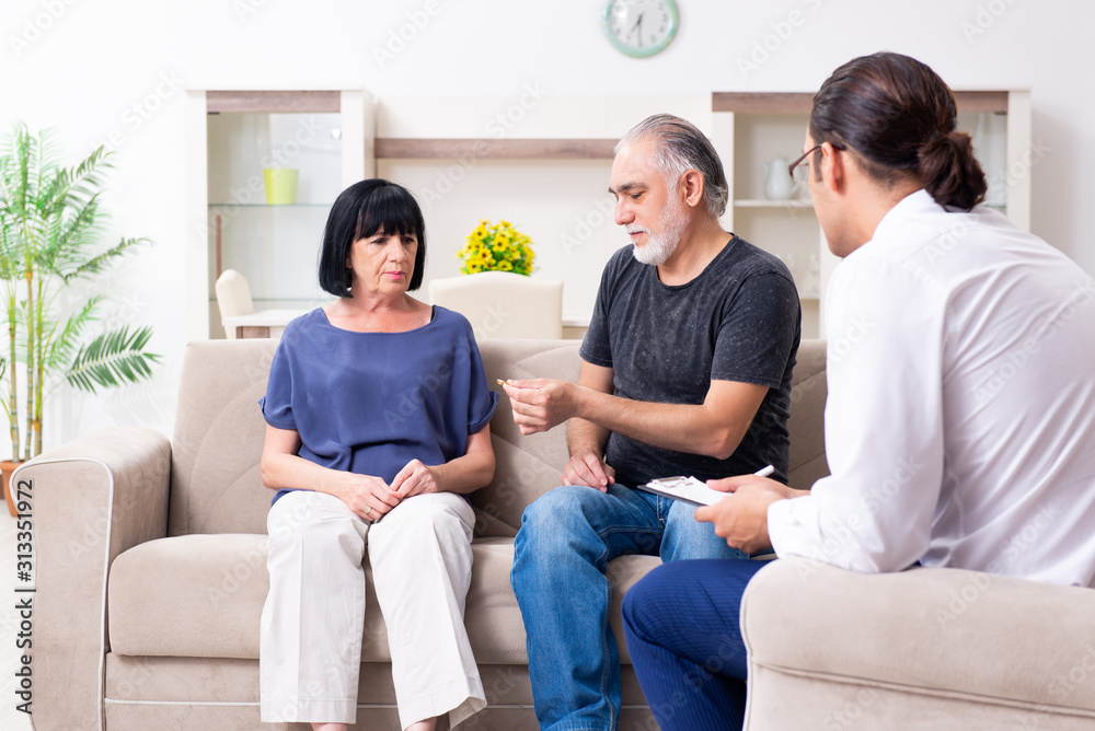 Old couple visiting psychiatrist doctor