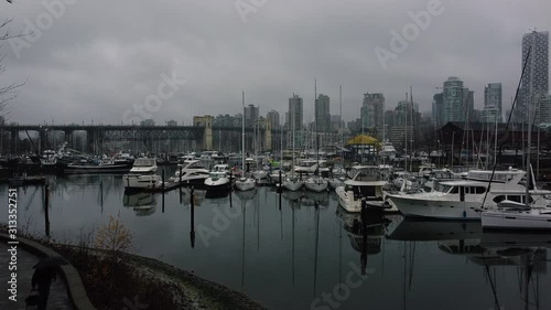 Marina with yachts on Granville Island with the Burard bridge on the background photo