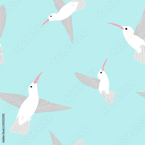 Hummingbirds in the blue sky seamless pattern. Good for textiles, home furnishing, wallpaper, surface pattern