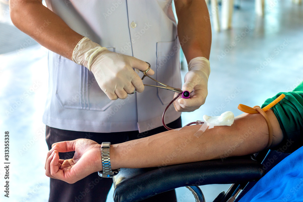 blood donation picture with soft-focus and over light in the background blood donation picture with soft-focus and over light in the background