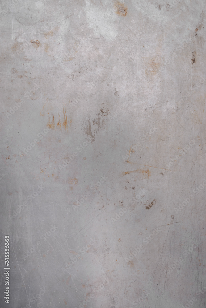 Abstract background. Gray shabby dirty sheet of metal with rust