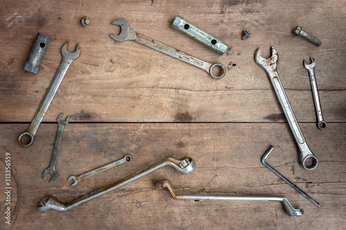 old tools on wooden floor background