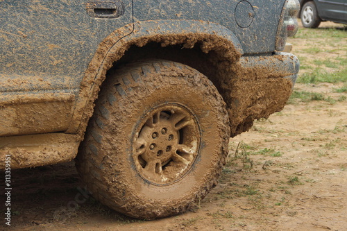 Dirty rear wheel 4x4 truck close up