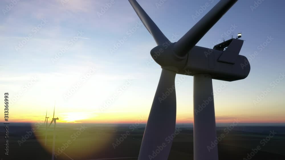 Aerial view of wind turbine at sunset Aerial view of wind turbine at sunset