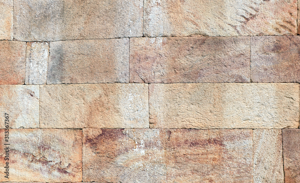 Fototapeta premium Granite stone wall, nice for background . Old castle stone wall as a background or texture.