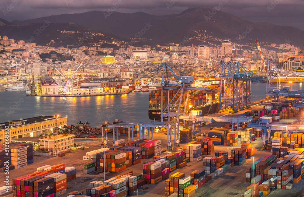 Obraz premium Genova, Genoa, Italy: Aerial view of shipping and container terminal, stacked containers and loading dock side cranes in the port of Genoa, Magazzini del cotone and Porto Antico, sea