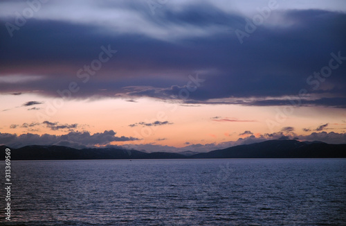 Dramatic cloudy sunset above Sevan Lake. Armenia.