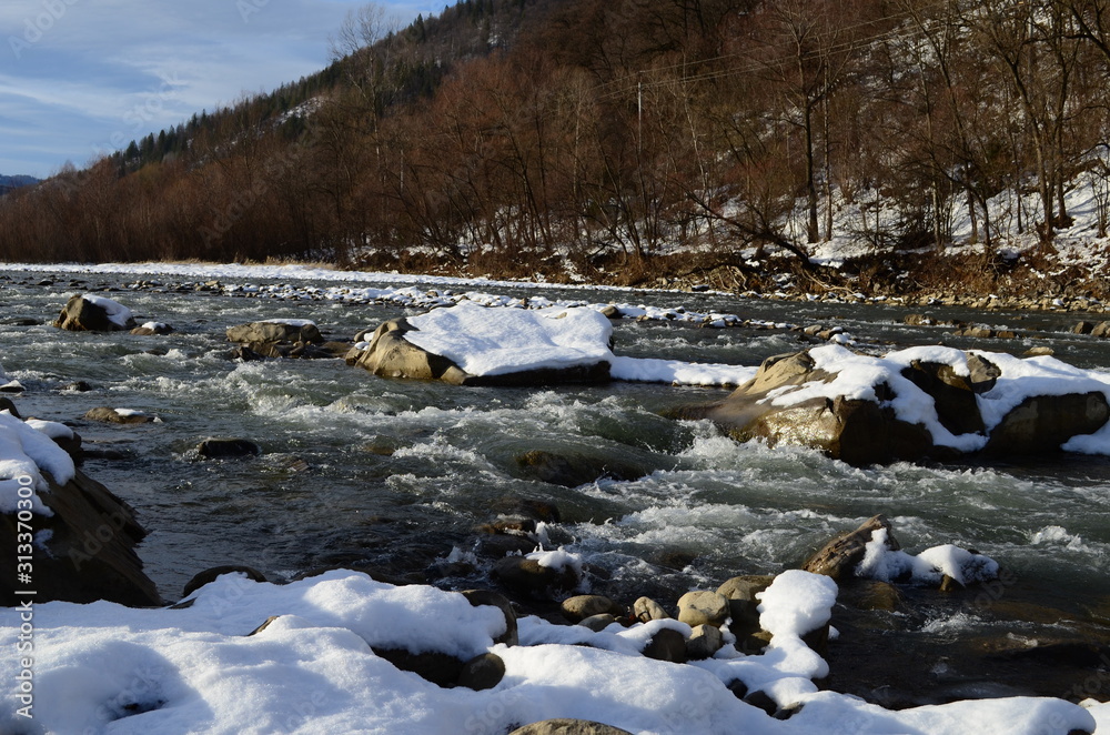 winter landscape in the forest with snow and blue sky and river winter landscape in the forest with snow and blue sky and river