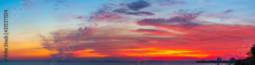 Beautiful landscape panorama with red and blue color sky, clouds and sunset. panoramic view of sunset