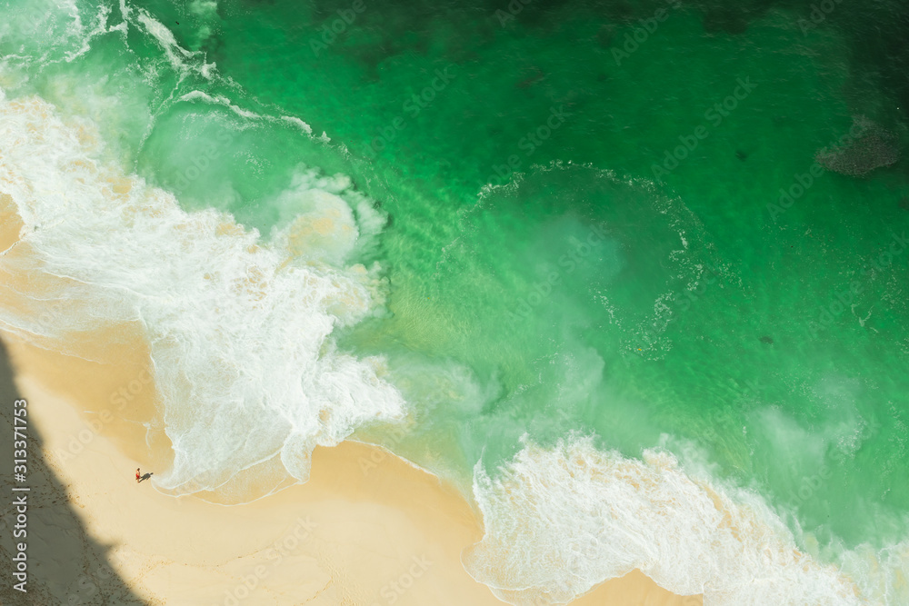 BALI, INDONESIA - DECEMBER 19, 2019: Stunning wild white sand tropical beach BALI, INDONESIA - DECEMBER 19, 2019: Stunning wild white sand tropical beach