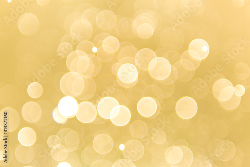 abstract gold background with soft blur bokeh light effect, background bokeh © DEEP PIXEL