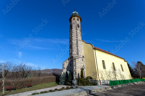 Medieval church in Gyongyossolymos, Hungary photo