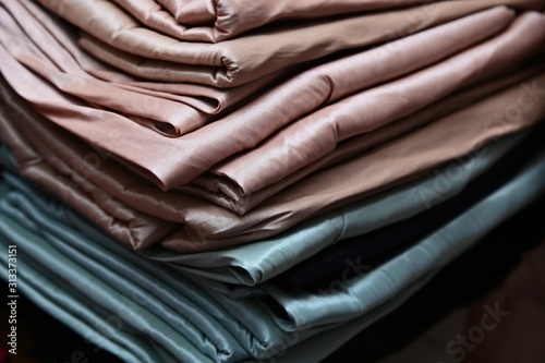 Taffeta fabric is a crisp, smooth, plain woven textile made from silk or cuprammonium rayons as well as acetate and polyester.