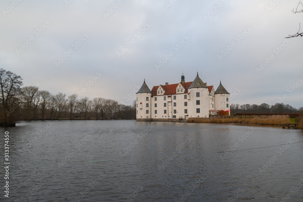 Glücksburg Castle from the  side by the water and bad weather