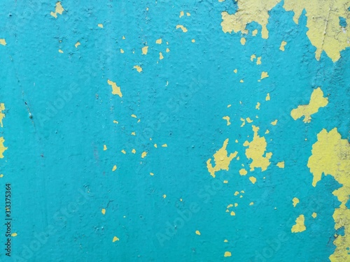 Blue grunge wall. Contemporary closeup for lifestyle design. Wallpaper pattern. Old dirty wall texture. Design template.