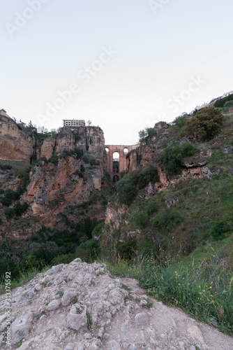 Distance view of the Puente Nuevo, New Bridge in Ronda during the sunrise, Andalusia, Spain