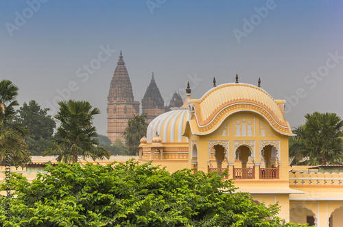 Hotel roof and towers of the Chaturbhuj Temple in Orchha, India photo
