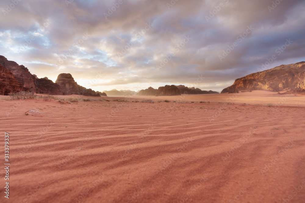 Wadi Rum desert landscape in Jordan, in the morning with sunrise sky