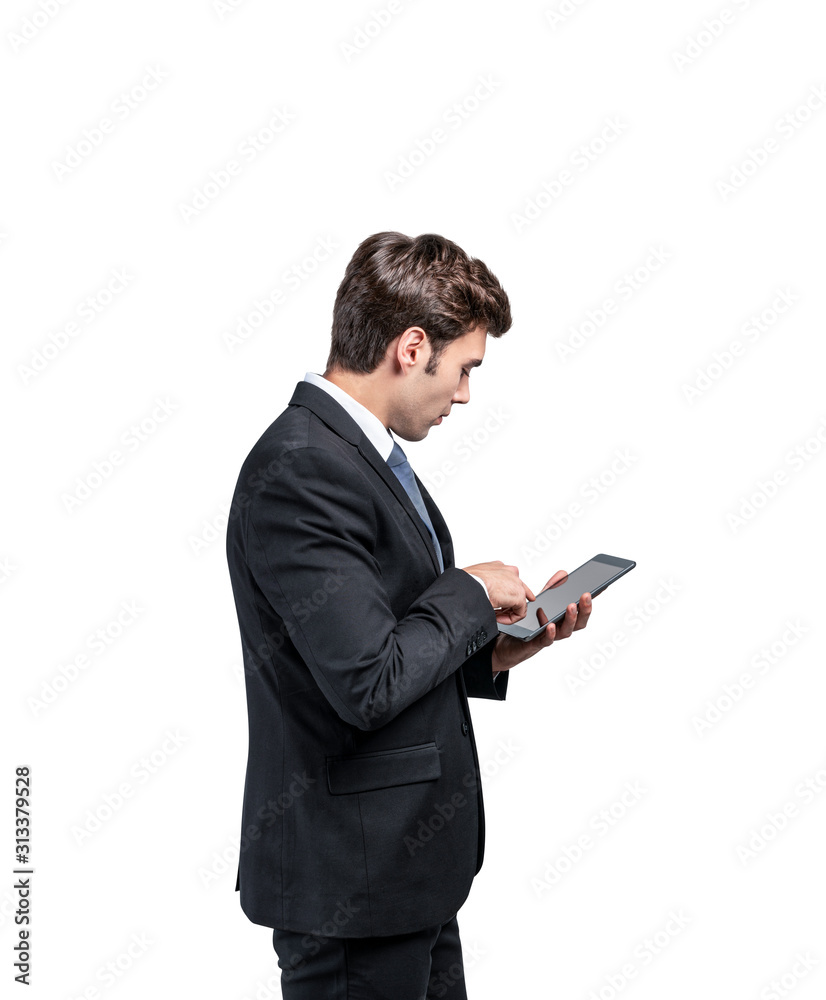 Side view of businessman using tablet computer
