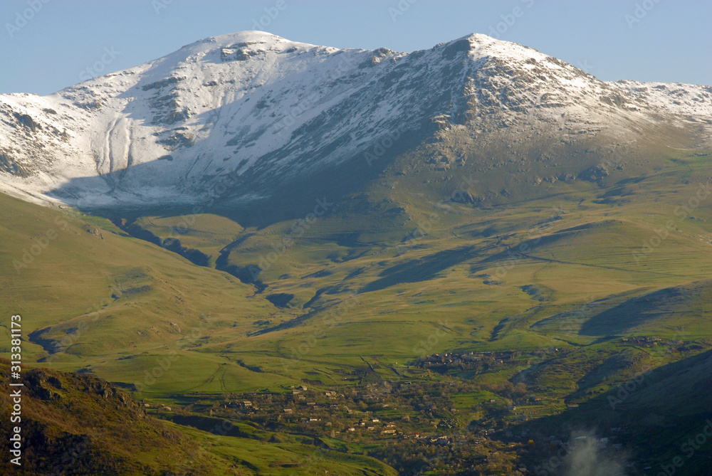 Kachachkut village on the mountainous background. Lori Region, Armenia.