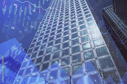 Forex chart on cityscape with tall buildings background multi exposure. Financial research concept.