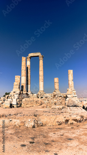 Ruined columns. Temple in the middle of Amman. Roman civilization. 