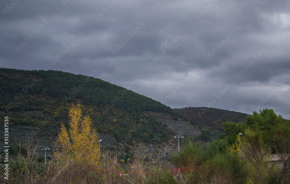 view of a stormy sky in the mountains