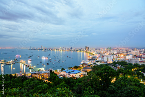 High view on viewpoint see cityscape with colorful light at the beach and the sea of Pattaya Bay, beautiful landscape of Pattaya City at sunset landmark in Chonburi, Travel Asia to Thailand