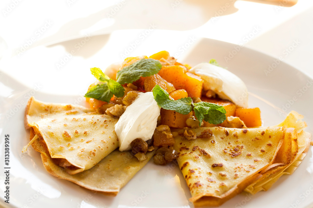 homemade pancakes with vegetables and pumpkin. Restaurant dish. homemade pancakes with vegetables and pumpkin. Restaurant dish.