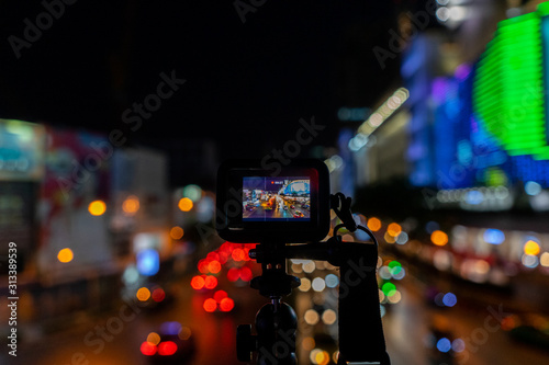 Action camera with lighting background at the night time
