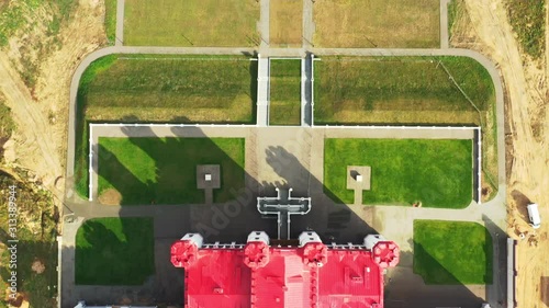 Kosava, Belarus. Aerial Bird's-eye View Of Famous Popular Historic Landmark Kosava Castle. It Is A Ruined Castellated Palace In Gothic Revival Style. Puslowski Palace Castle. Landmark And Heritage photo