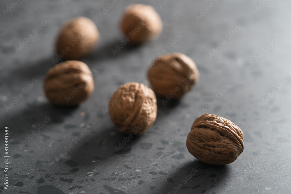 inshell walnuts on terrazzo countertop inshell walnuts on terrazzo countertop