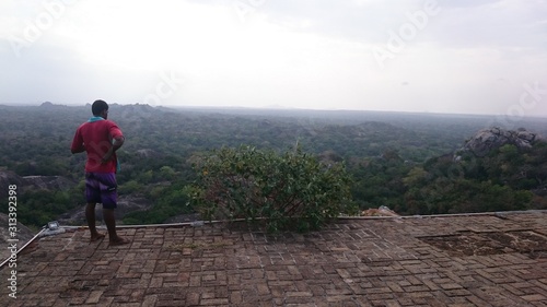 Man enjoys the view of the endless landscape