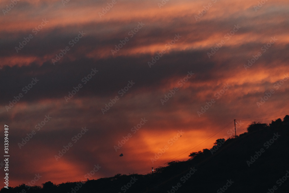 Beautiful clouds above the hills during sunset at Wankaner, Gujarat, India Beautiful clouds above the hills during sunset at Wankaner, Gujarat, India