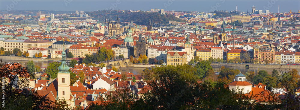 Prague - The panorama of the city with the Charles bridge and the Old Town  in evening light.