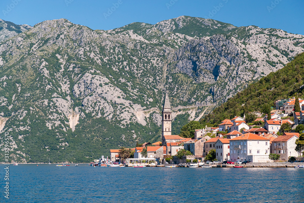 Beautiful shot of buildings and a tower in the distance in Kotor, Montenegro