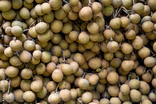 Pile Of Longan Fruit For Sell at Food Market, Thailand, Close Up