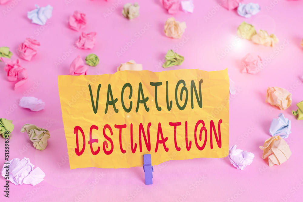 Handwriting text writing Vacation Destination. Conceptual photo a place where showing go for holiday or relaxation Colored crumpled papers empty reminder pink floor background clothespin