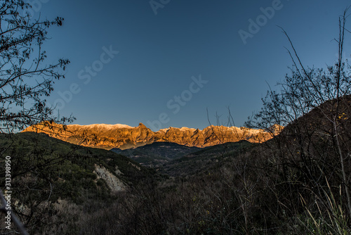 Tzoumerka mountain on a beautiful winter day just a little before sunset photo