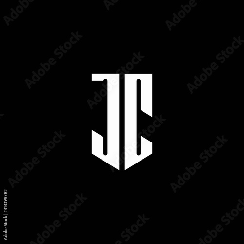 JC logo monogram with emblem style isolated on black background