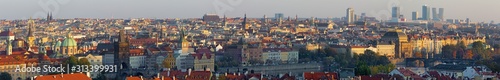 Prague - The panorama of the city with the Charles bridge and the Old Town in evening light.