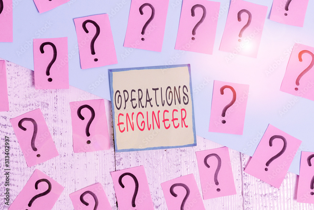 Handwriting text writing Operations Engineer. Conceptual photo analyze and design operation that will improve work flow Scribbled and crumbling papers with thick cardboard above wooden table Handwriting text writing Operations Engineer. Conceptual photo analyze and design operation that will improve work flow Scribbled and crumbling papers with thick cardboard above wooden table
