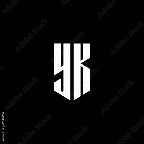 YK logo monogram with emblem style isolated on black background photo