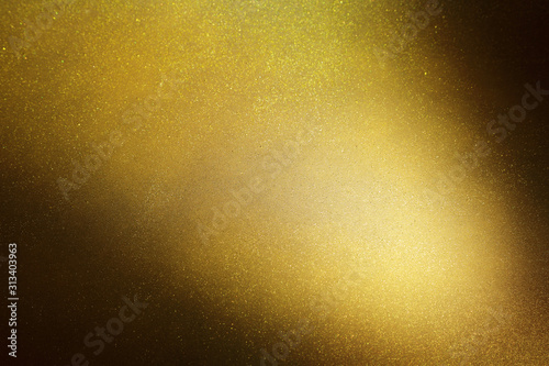 Tekstura złotego, żółtego tła z cieniem.