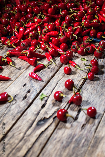 Red hot chili pepper scattered on wooden. Country photo