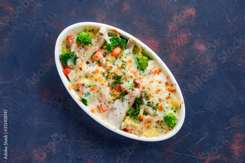 Broccoli and pike gratin with cheese, top view