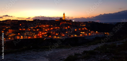 Beautiful sunset in the backgroud is old italian town