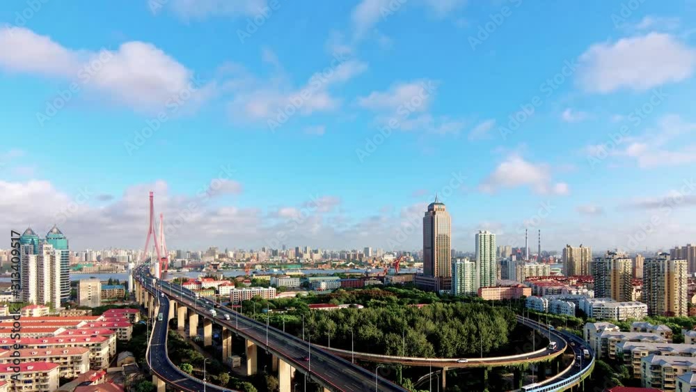 Panoramic view of Shanghai Yangpu bridge and cityscapes in sunny day, time lapse video, 4k footage, clouds and cars moving fast, beautiful landscape. Panoramic view of Shanghai Yangpu bridge and cityscapes in sunny day, time lapse video, 4k footage, clouds and cars moving fast, beautiful landscape.